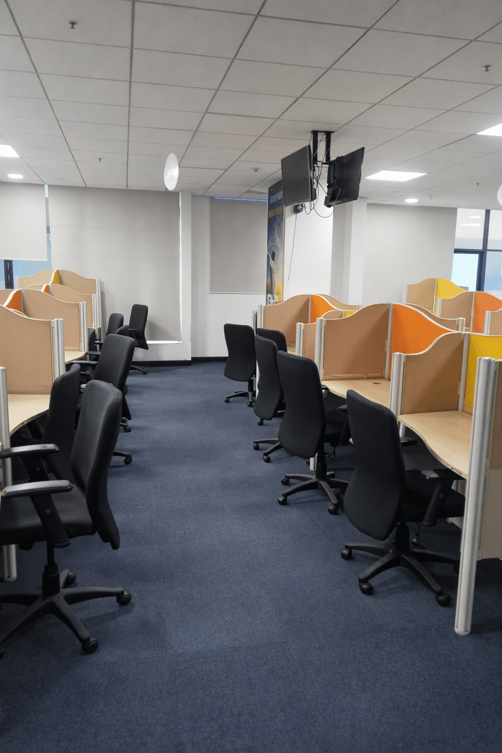 Open cubicle work floor at Elite Co-Working Indore
